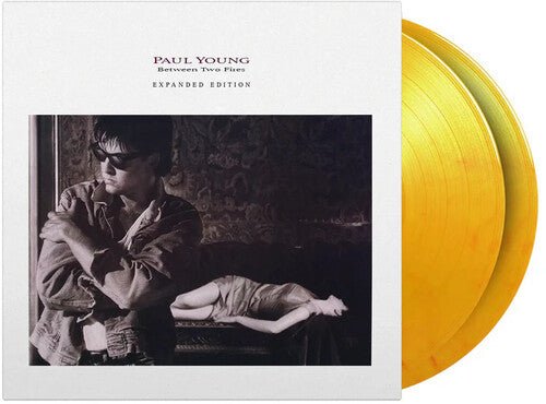 YOUNG,PAUL - BETWEEN TWO FIRES - RECORD